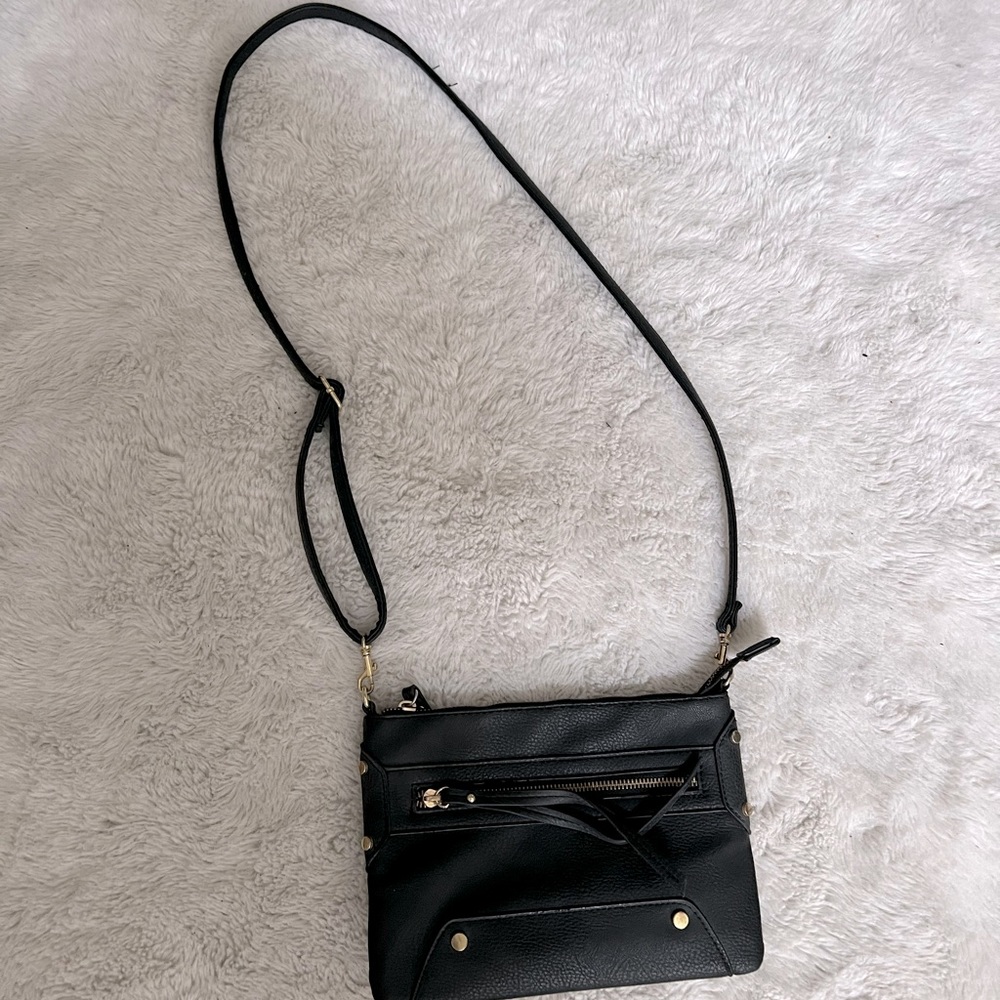 Black cross body purse.